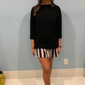 Flowy back dress with striped detailing.